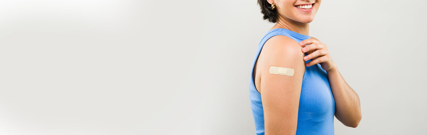 a person with a band aid on her shoulder