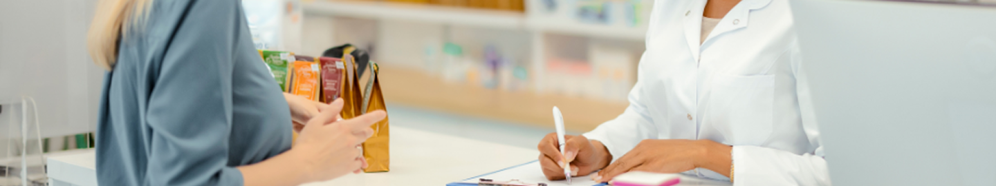 a hand holding a pen