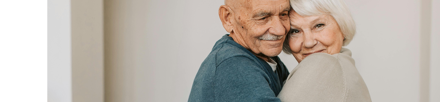 a man with a mustache smiling